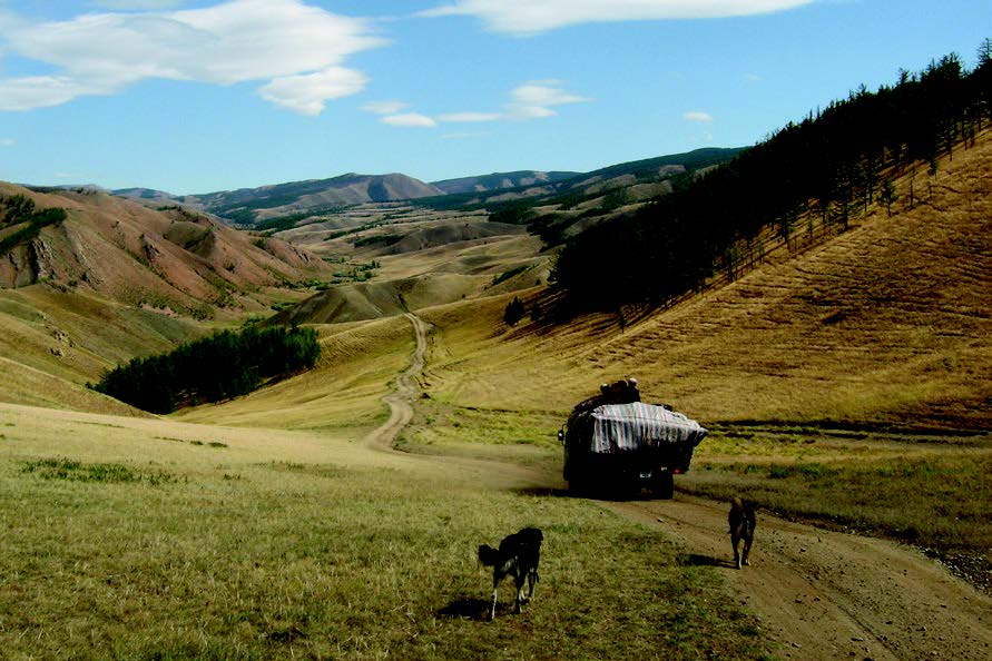 A picture containing grass, sky, outdoor, mountain Description automatically generated