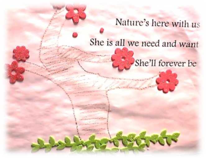 A drawing of a tree with green stickers below representing the grass. There are flower stickers on the branches of the trees and a poem that reads, "Nature's here with us She is all we need and want She'll forever be."