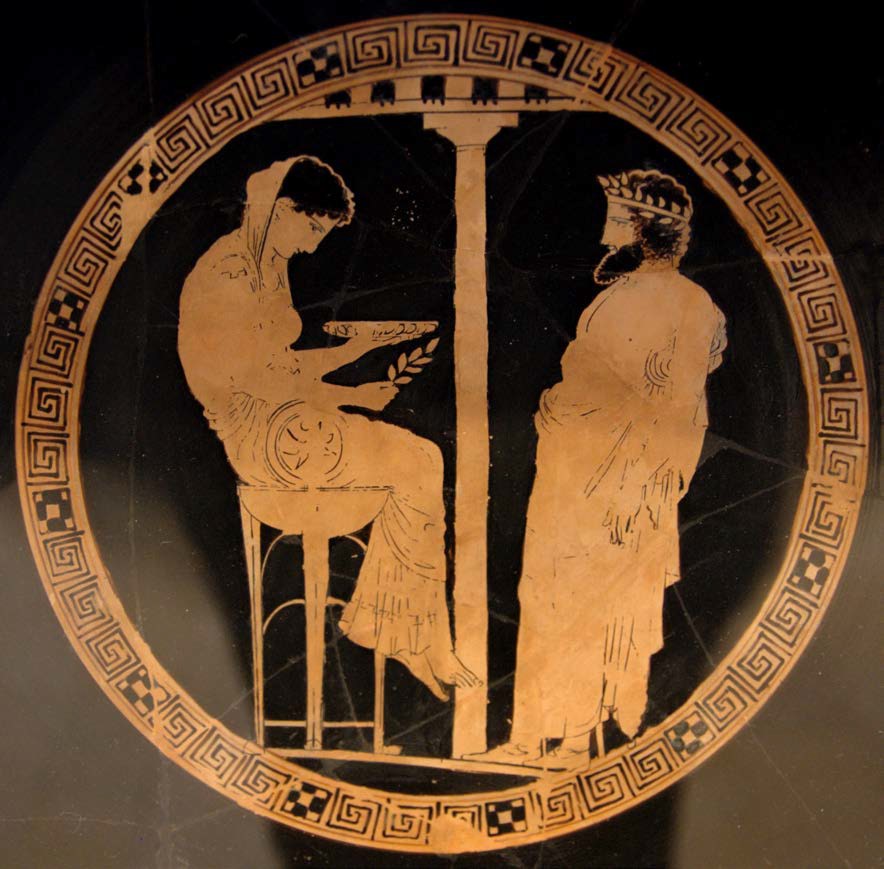 The Pythia seated on the tripod and holding a laurel branch – symbols of Apollo, who was the source of her prophecies.