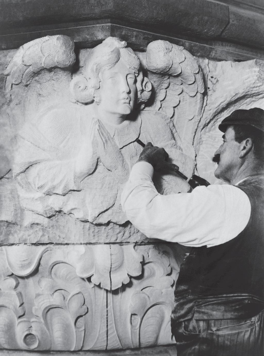 Sculptor Carving Stone 