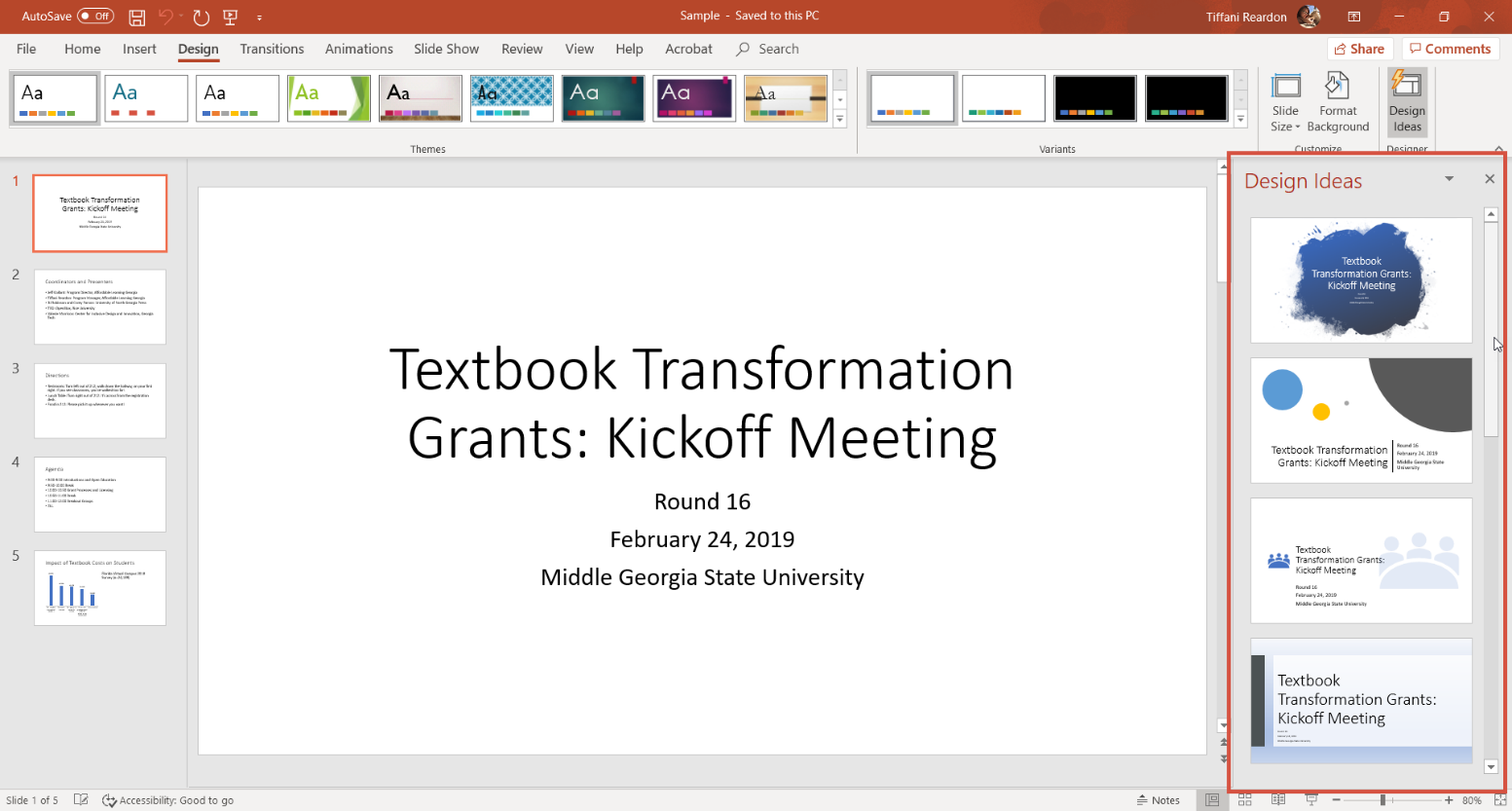 MS PowerPoint. The Design Ideas feature is open and highlighted.