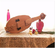 a modern reproduction of a medieval fiddle or vielle which is played with a bow