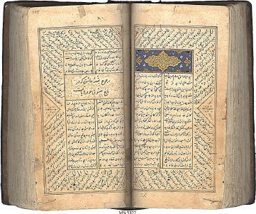 A picture containing text, plaque, wooden, binding Description automatically generated