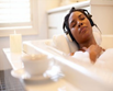 a woman taking a bath