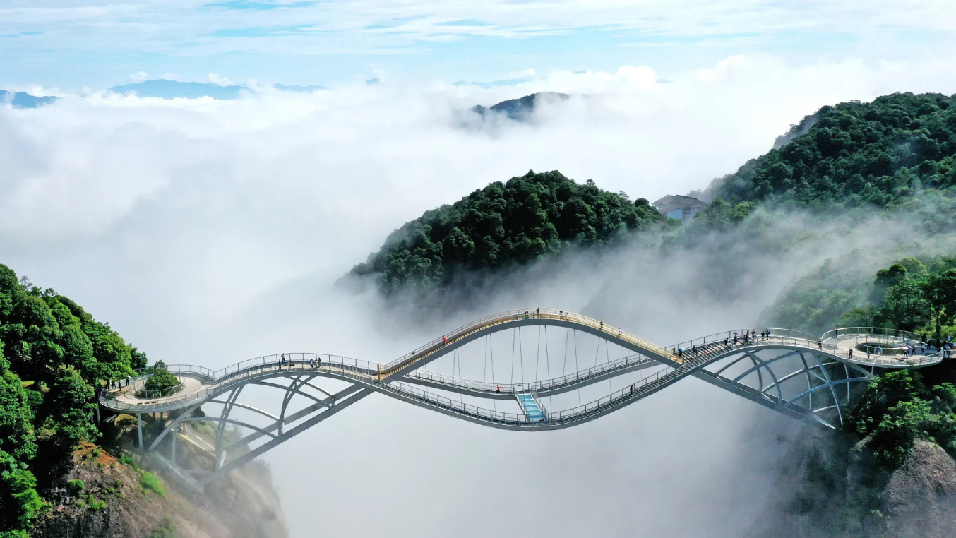 A bridge over a mountain

Description automatically generated