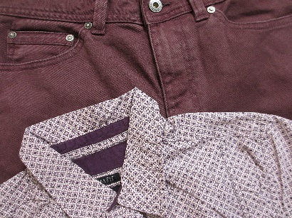 A photograph of some brown denim pants and a matching shirt with collar.