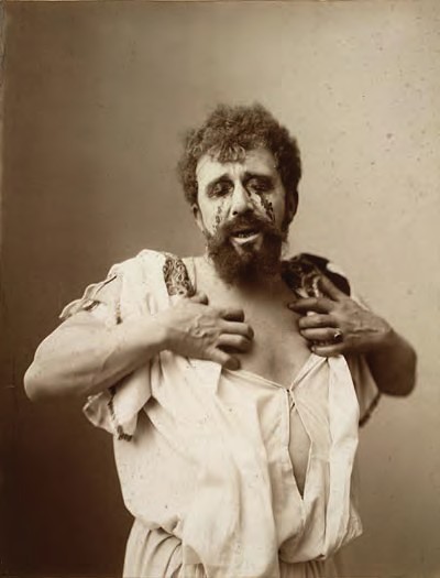 A picture containing person, wall Description automatically generated