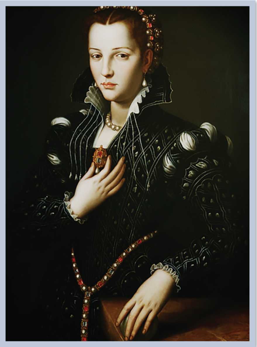 A woman holding a piece of jewelry.