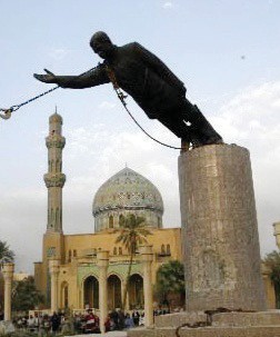 Statue of Saddam Hussein being toppled in Firdos Square after the US invasion of Iraq. 