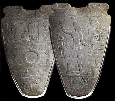 Two sides of the stone pallette of Narmer showing engravings.