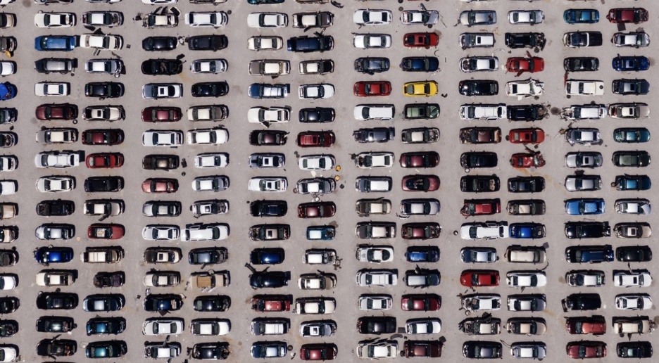 a bunch of cars in a parking lot