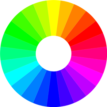 A colorful circular diagram is shown in the image. The diagram is a color wheel, displaying a smooth gradient of colors from red, orange, yellow, green, blue, to violet. The colors are arranged in a continuous spectrum around a white center.